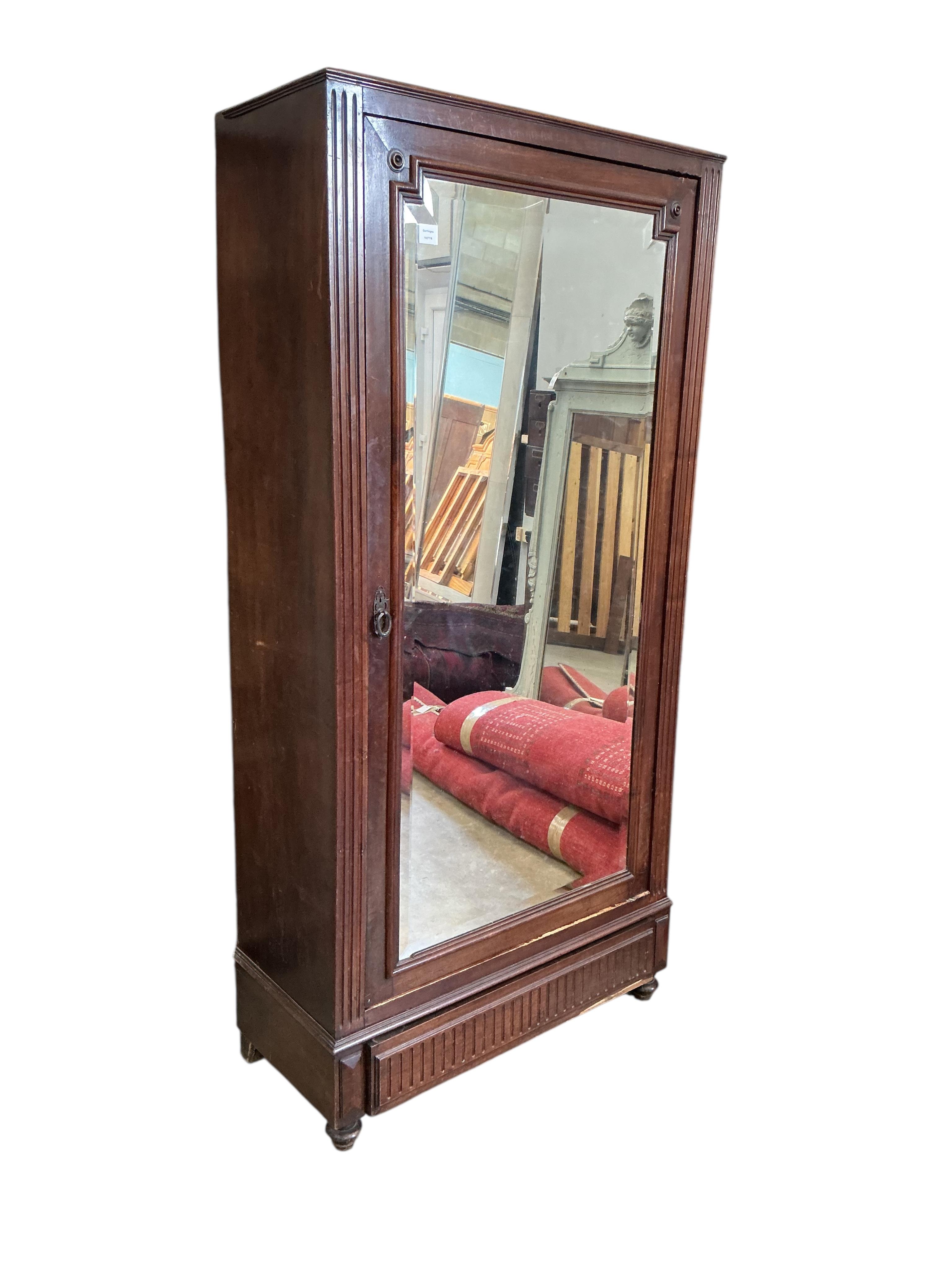 A 19th century French mirrored mahogany armoire, width 98cm, depth 43cm, height 201cm